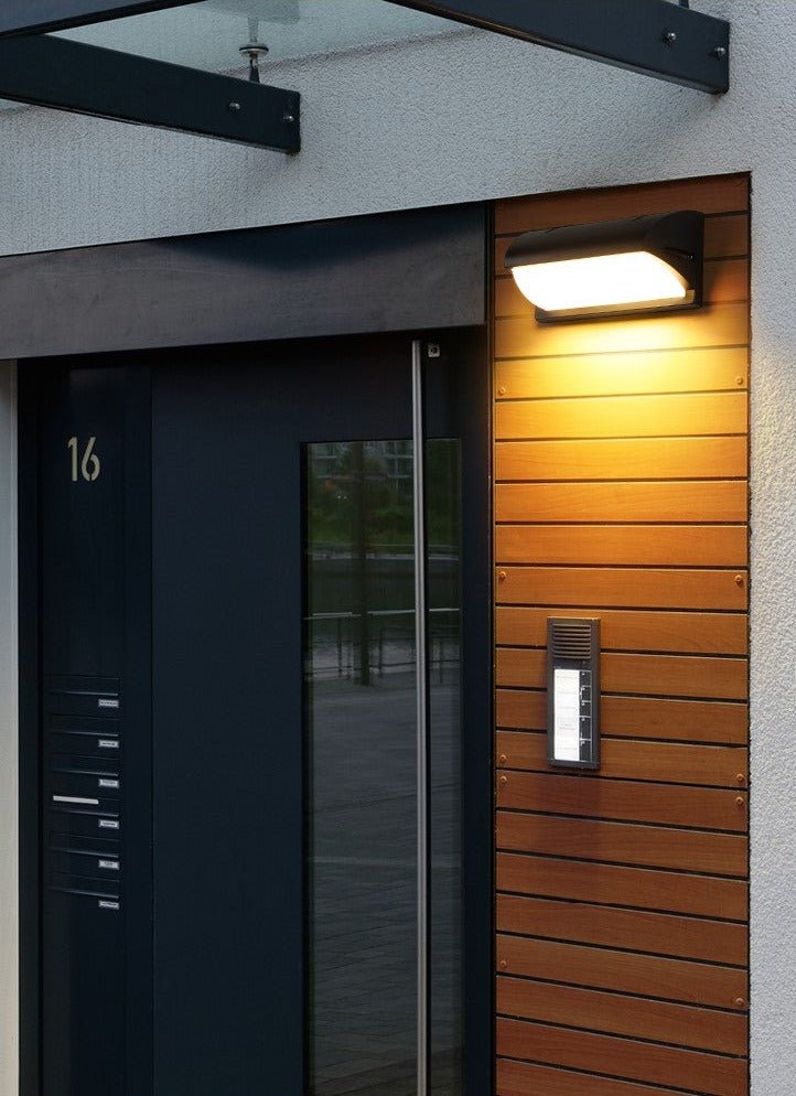 Arvid outdoor wall light by BO-HA beside a front door